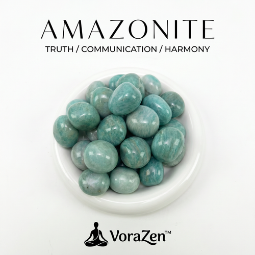 VoraZen™ Natural Amazonite Tumbled Stones in a white porcelain bowl. These vibrant aqua-green healing crystals, known for Truth and Harmony, feature a smooth polished finish. Perfect for meditation and crystal grids.
